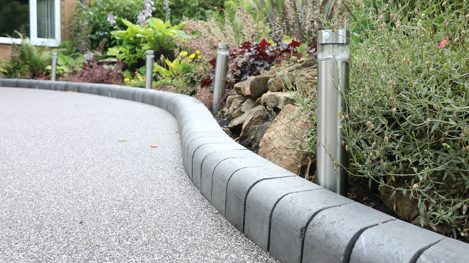 Transform your property with a smooth, durable, and stylish resin bound driveway.